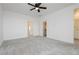Large, bright bedroom featuring plush carpeting and space for personalization at 7777 Vino Vranec Ct, Las Vegas, NV 89113