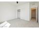Clean bedroom with neutral carpet, recessed lights, closet and connecting door at 7777 Vino Vranec Ct, Las Vegas, NV 89113