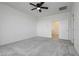 Large, bright bedroom featuring plush carpeting and a closet ready for personalization at 7777 Vino Vranec Ct, Las Vegas, NV 89113
