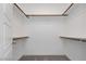 Walk-in closet is empty with rod and shelf for optimal storage and organization at 7777 Vino Vranec Ct, Las Vegas, NV 89113