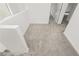 This upper level hallway has neutral carpet and leads to several doorways at 7777 Vino Vranec Ct, Las Vegas, NV 89113