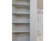 Close-up of bathtub shower combo and built-in shelves in bathroom at 7885 W Flamingo Rd # 2005, Las Vegas, NV 89147