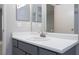Bathroom featuring a gray vanity with a white countertop, sink, and modern faucet at 7885 W Flamingo Rd # 2005, Las Vegas, NV 89147