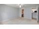 Spacious bedroom with carpet floors and open bathroom and kitchen at 7885 W Flamingo Rd # 2005, Las Vegas, NV 89147