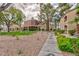 View of community featuring lush landscaping, walkways, and distinct building exteriors at 7885 W Flamingo Rd # 2005, Las Vegas, NV 89147