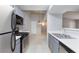 Modern kitchen with stainless steel appliances, gas range, and sleek countertops at 7885 W Flamingo Rd # 2005, Las Vegas, NV 89147