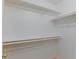 Bright walk-in closet featuring white walls and shelving perfect for organizing clothes and accessories at 7885 W Flamingo Rd # 2005, Las Vegas, NV 89147