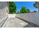 A backyard featuring a spacious concrete patio and a perimeter privacy wall at 811 Spyglass Ln, Las Vegas, NV 89107