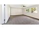 This spacious bedroom is well-lit with neutral walls and plush carpet at 811 Spyglass Ln, Las Vegas, NV 89107