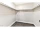 This closet offers ample storage with built in shelves, carpeted floor and ample space at 811 Spyglass Ln, Las Vegas, NV 89107