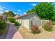 Charming single-story home featuring a red tile roof and lush landscaping at 811 Spyglass Ln, Las Vegas, NV 89107