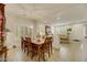 Dining area offering tile floors, wood furniture, and an open-concept layout at 8176 Duncan Peak Ct, Las Vegas, NV 89139