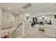 Open office space with multiple desks, natural light, and neutral carpeting at 8176 Duncan Peak Ct, Las Vegas, NV 89139