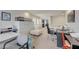 Large open office space with neutral carpeting and multiple desk setups at 8176 Duncan Peak Ct, Las Vegas, NV 89139