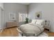 Cozy bedroom has wood floors and lots of natural light at 8450 Alta Dr # 220, Las Vegas, NV 89145