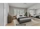 Relaxing bedroom features a comfortable bed and mirrored closet doors at 8450 Alta Dr # 220, Las Vegas, NV 89145