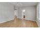Spacious bedroom leads into the bathroom with wood floors at 8450 Alta Dr # 220, Las Vegas, NV 89145