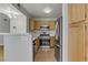 Functional kitchen with tile floors and stainless steel appliances at 8450 Alta Dr # 220, Las Vegas, NV 89145