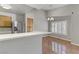 The open concept kitchen features stainless steel appliances at 8450 Alta Dr # 220, Las Vegas, NV 89145