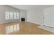 Bright living room with wood floors and a fireplace at 8450 Alta Dr # 220, Las Vegas, NV 89145