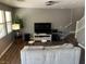 Cozy living room features hardwood floors, neutral walls and natural light at 8977 Melridge Rd, Las Vegas, NV 89148