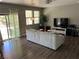 Comfortable living room filled with light boasts sliding doors to the outdoor living spaces at 8977 Melridge Rd, Las Vegas, NV 89148