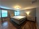 Spacious bedroom with natural light and hardwood floors at 8977 Melridge Rd, Las Vegas, NV 89148