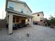 Paver patio with covered seating area, perfect for outdoor dining and entertaining at 8977 Melridge Rd, Las Vegas, NV 89148