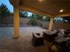 Covered patio area with comfortable seating, perfect for enjoying the outdoors in any weather at 8977 Melridge Rd, Las Vegas, NV 89148