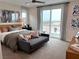 The primary suite includes a couch, view, and decor at 933 Hunter Shores Ave, North Las Vegas, NV 89084