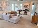 An upstairs living room area featuring two built-in office spaces and a sectional sofa at 933 Hunter Shores Ave, North Las Vegas, NV 89084