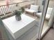 Inviting patio features a modern coffee table and comfortable seating, perfect for outdoor relaxation at 933 Hunter Shores Ave, North Las Vegas, NV 89084