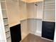 Organized walk-in closet with custom shelving and drawers, offering ample storage space at 933 Hunter Shores Ave, North Las Vegas, NV 89084
