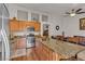 Kitchen with stainless steel appliances, granite counters, and island at 9562 Collinsleap Ct, Las Vegas, NV 89123