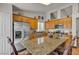 Spacious kitchen with stainless steel appliances and granite island at 9562 Collinsleap Ct, Las Vegas, NV 89123