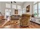 Comfortable living room with tall ceilings, natural light, and stylish decor at 9562 Collinsleap Ct, Las Vegas, NV 89123