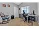 Bright office space with gray walls, carpet flooring, and an adjustable office chair at 9562 Collinsleap Ct, Las Vegas, NV 89123