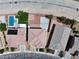 Aerial view of the properties, showing a refreshing backyard pool and various patio surfaces at 9604 Vital Crest St, Las Vegas, NV 89123