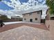Expansive backyard featuring a mix of gravel and paver areas, offering versatile outdoor space at 9604 Vital Crest St, Las Vegas, NV 89123