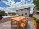 Staged backyard with a patio dining set, adding a touch of elegance to outdoor entertaining at 9604 Vital Crest St, Las Vegas, NV 89123