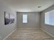 Bedroom featuring natural light and light wood flooring at 9604 Vital Crest St, Las Vegas, NV 89123