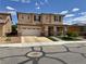 Charming two-story home with a well-kept lawn and desert landscaping at 9604 Vital Crest St, Las Vegas, NV 89123