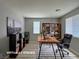 Staged office featuring a sleek desk and ergonomic black chair at 9604 Vital Crest St, Las Vegas, NV 89123