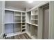 Well-organized walk-in closet featuring built-in shelving and rods for maximum wardrobe and accessory storage at 9604 Vital Crest St, Las Vegas, NV 89123