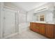 Well-lit bathroom featuring a soaking tub, shower, and double sink vanity at , Las Vegas, NV 89149