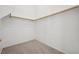 Bright closet with upper clothing rod on white walls and neutral carpeted floor, offering efficient storage at , Las Vegas, NV 89149