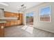 Eat in kitchen area features hardwood floors, a window and a sliding glass door to the backyard at , Las Vegas, NV 89149