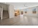 Bright living room featuring hardwood floors, a ceiling fan, and natural light at , Las Vegas, NV 89149