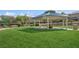 Green park featuring a gazebo with a picnic table and lush grass, perfect for outdoor gatherings at , Las Vegas, NV 89149