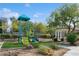 Community playground with a variety of play structures and landscaping, fostering a safe environment at , Las Vegas, NV 89149